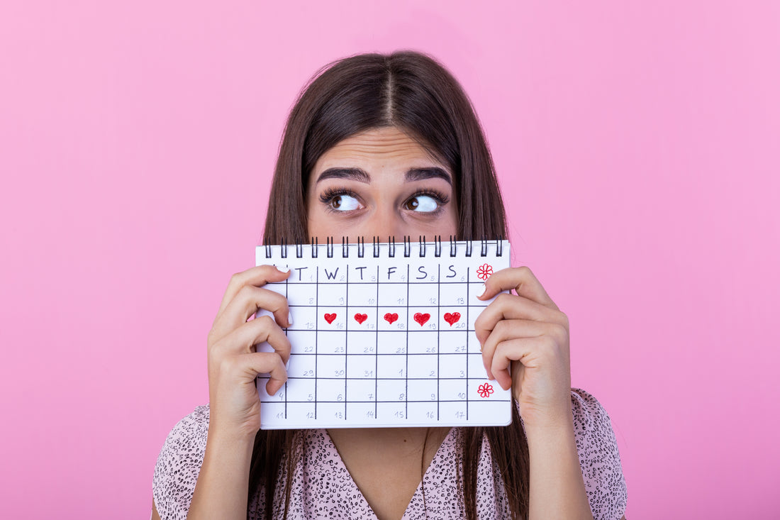 Woman who is about to come onto her period, struggling with fatigue and pain